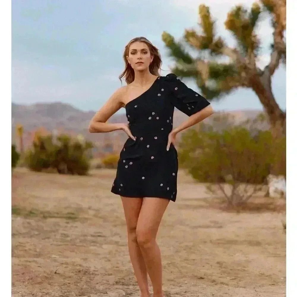 Park & Fifth strapless one shoulder dress. This is classy and sophisticated.